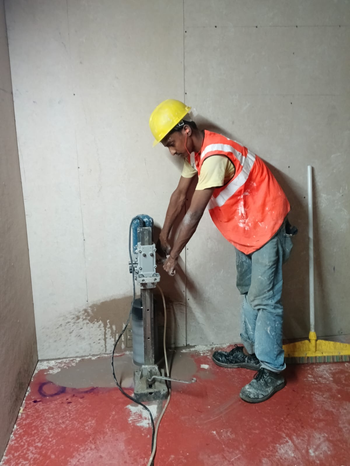 Core rig drilling on an occupied floor